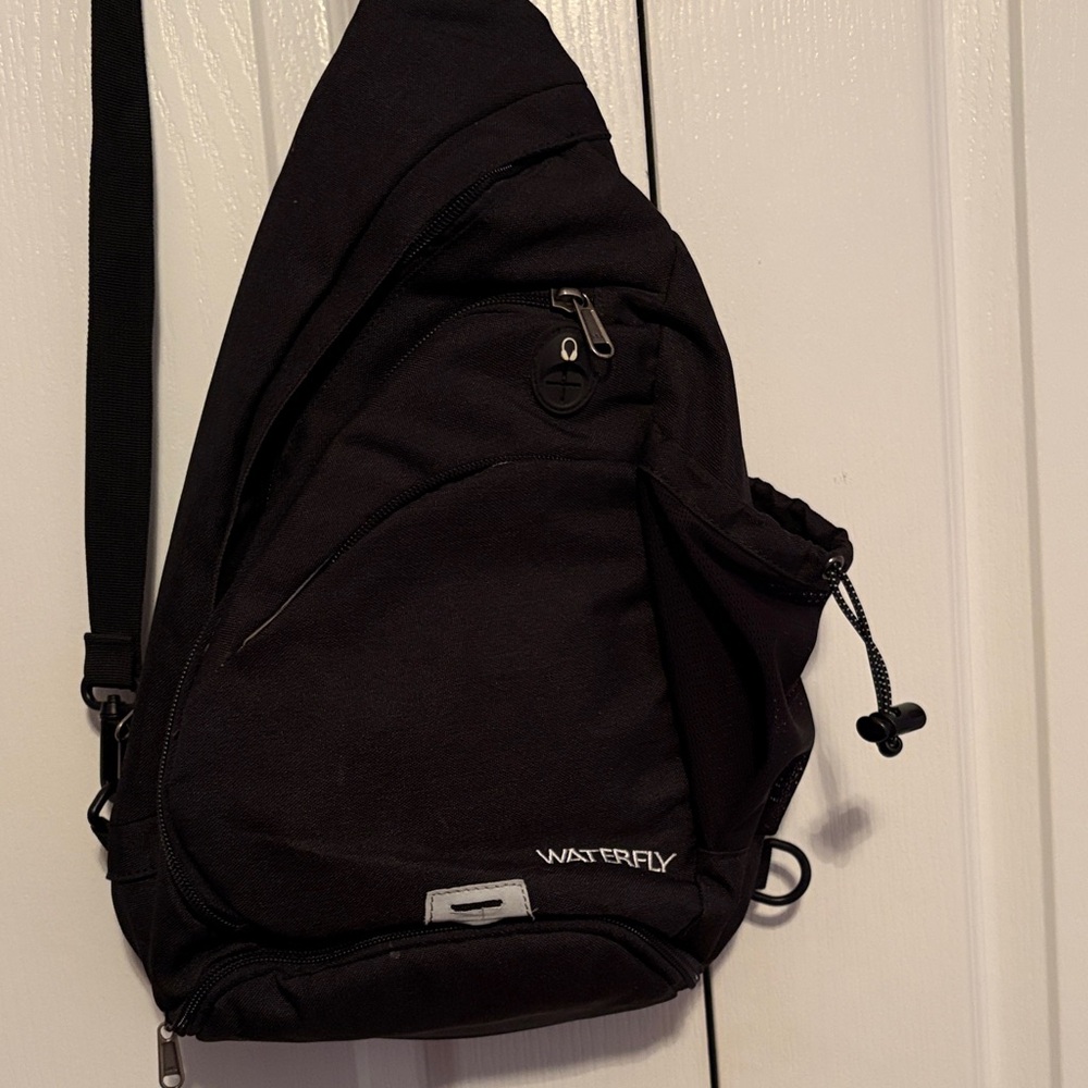 Waterfly Black Travel Sling Bag for Women